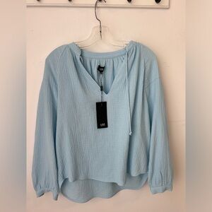 LINE light blue top with strings